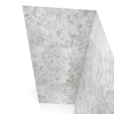 Close-up of limestone-patterned acrylic shower wall panels showing textured gray and white marble-look finish