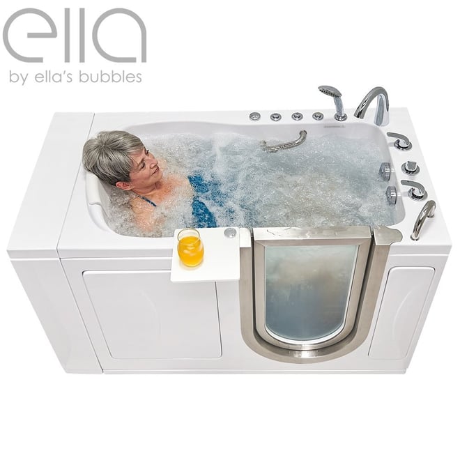 Senior woman relaxing in an Ella Elite walk-in tub with dual hydro massage jets and a drink on the side tray