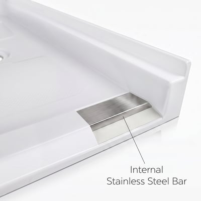 Reinforced roll-in acrylic shower base cutaway showing the internal stainless steel bar beneath the low threshold edge