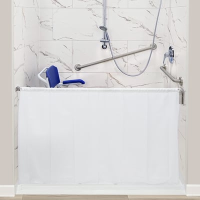 Ella's Bubbles caregiver shower curtain open across accessible shower stall with blue fold-down seat and grab bars