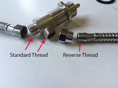 Chrome walk-in tub diverter valve components showing standard thread and reverse thread connections with flexible hose
