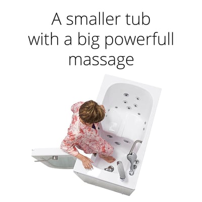 Senior woman stepping into the Ella Mobile compact walk-in tub with dual hydro massage jets and outward swing door