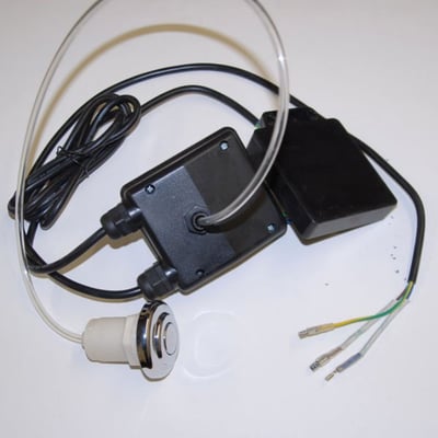 Walk-in tub push button air control switch with black junction box, chrome button, tubing, and wiring components