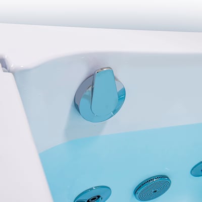 Close-up of chrome control knob and hydrotherapy jets inside the Ella Homecare transfer walk-in bathtub interior