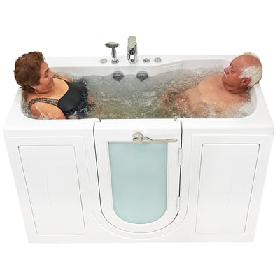 Senior couple relaxing together and smiling during a hydro massage soak in an Ella two-person walk-in tub with glass door