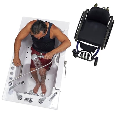 Wheelchair user showering with handheld wand inside an Ella Transfer60 walk-in tub, wheelchair parked alongside