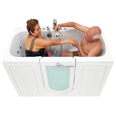 Senior couple laughing and using a handheld showerhead together inside an Ella two-seat walk-in tub with side entry door