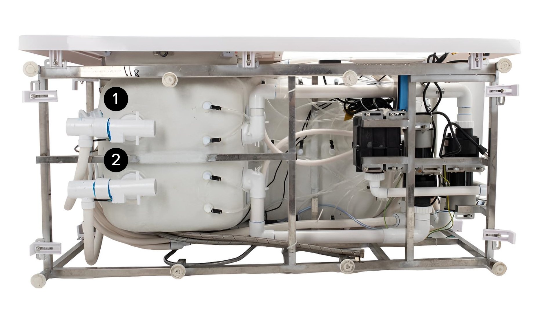 Underside of an Ella walk-in tub showing the stainless steel frame, plumbing, pumps and wiring bonded to the fiberglass-backed acrylic shell