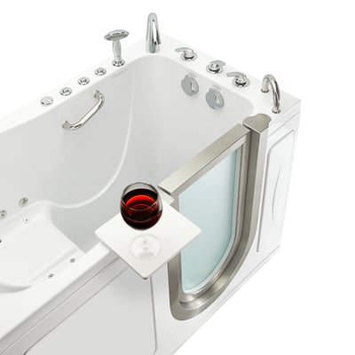 Ella Elite walk-in tub 30x52 with swivel tray holding a red wine glass, chrome faucets, and frosted inward swing door