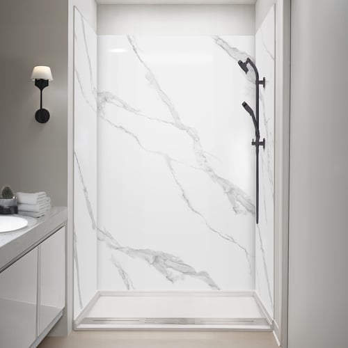 Ella accessible shower stall with Calacatta Lux marble-look wall panels and matte black handheld showerhead on slide bar