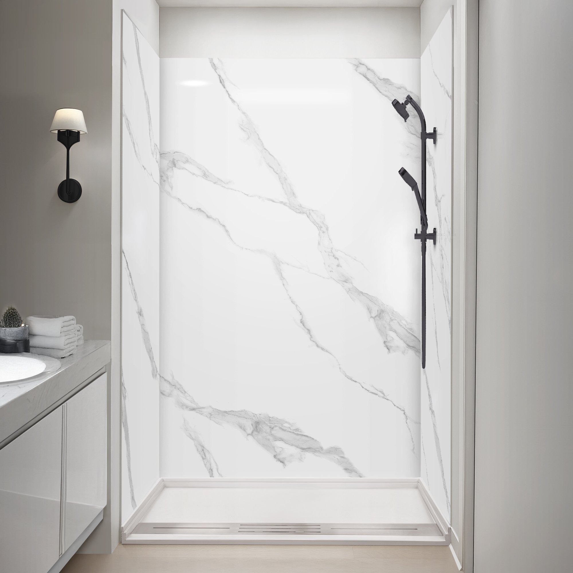 Ella accessible shower stall with Calacatta Lux marble-look wall panels and matte black handheld showerhead on slide bar