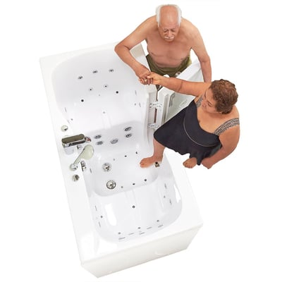Aerial view of senior couple using an Ella two-person walk-in tub with hydro massage jets and chrome faucet controls