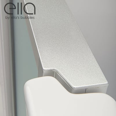 Close-up of the silver aluminum door hinge and white acrylic frame on an Ella Ultra walk-in tub door