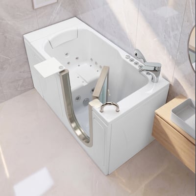 Ella Petite walk in tub with outward swing door, hydrotherapy jets, grab bar and chrome faucet in a marble bathroom