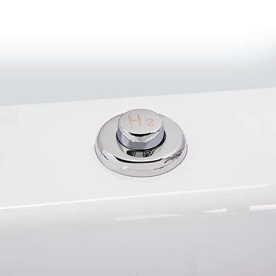 Close-up of a chrome H2 hydrogen therapy control button mounted on the white acrylic surface of an Ella walk-in tub