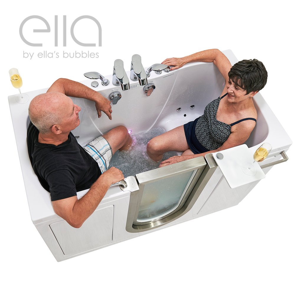 Senior couple relaxing together with champagne in the Ella Companion two-seat acrylic walk-in tub with hydro jets