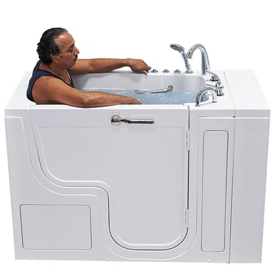 Man soaking in the Ella Transfer 30 wheelchair accessible walk-in tub with dual massage jets and chrome faucet fixtures