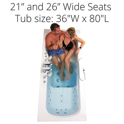 Couple toasting drinks while seated together in the Ella Big4Two two-seat walk-in tub, 36