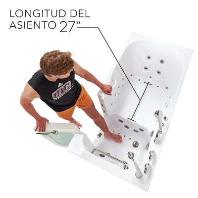 Hombre entrando en una bañera de acceso Ella mostrando la longitud del asiento de 27 pulgadas con chorros de hidromasaje, barras de apoyo y puerta de apertura hacia fuera
