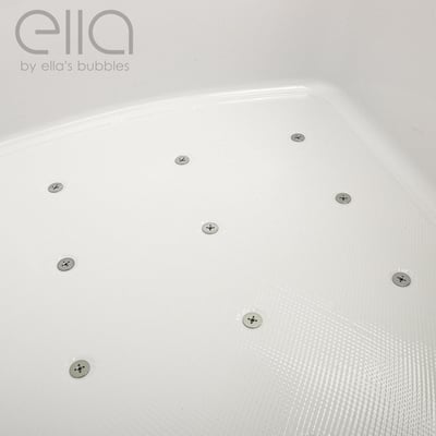 Gros plan du fond texturé antidérapant et des buses de jet d'air en acier inoxydable à l'intérieur d'une baignoire à porte allongée Ella