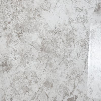Close-up of limestone texture acrylic panel shower wall kit with gray and white marble-style finish