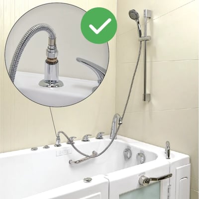 Close-up of chrome walk-in tub faucet coupling and flexible hose kit with handheld showerhead on 24-inch slide bar