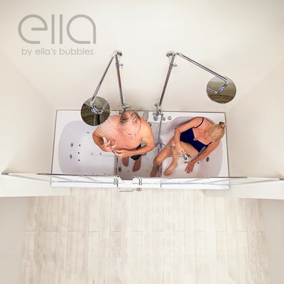Overhead view of a couple showering together in the Ella Big4Two two-seat walk-in tub with dual rainfall showerheads