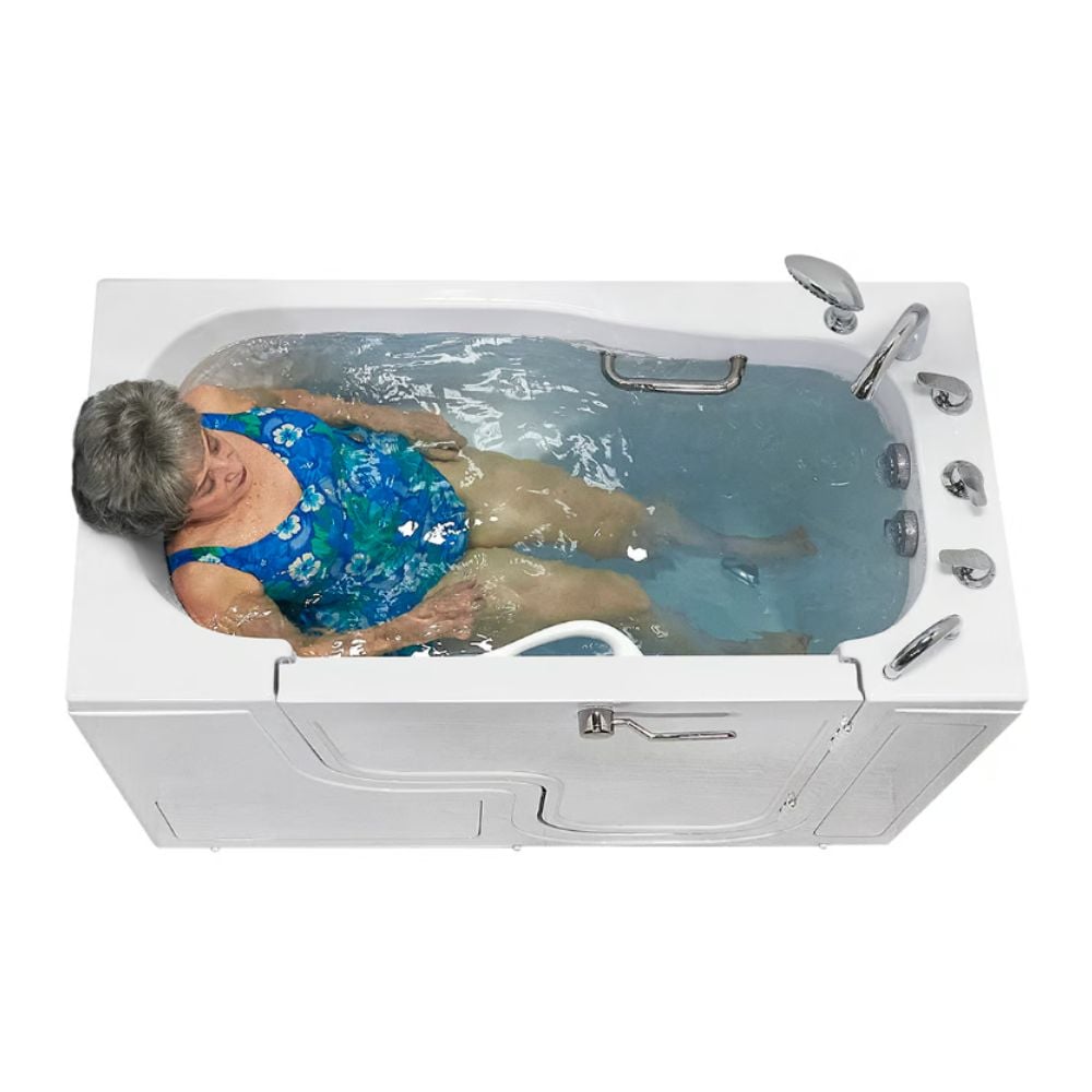 Senior woman relaxing in the Ella Transfer60 wheelchair accessible walk-in tub with hydro massage jets