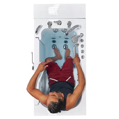 Overhead view of a person reclining in the Ella Transfer30 ADA accessible walk-in tub showing dual massage jets and grab bars