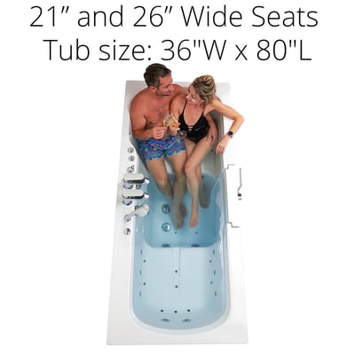 Couple toasting with champagne seated in the Ella Big4Two two-seat walk-in tub with air and hydro jets, 36x80 inches