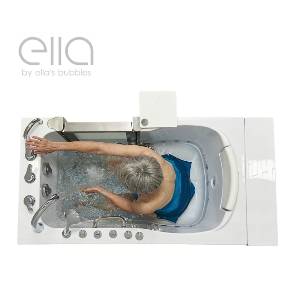 Overhead view of a senior woman soaking in the Ella Royal acrylic walk-in tub with hydro massage jets active