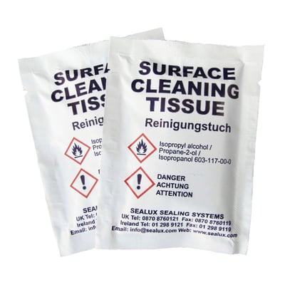 Two Sealux isopropyl alcohol surface cleaning tissue packets included with Ella walk-in tub tile flange installation kit