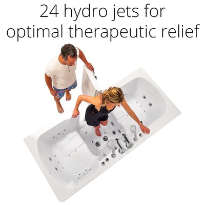 Woman stepping into the Ella Big4Two two-seat walk-in tub with 24 hydro jets while a man holds the outward swing door open
