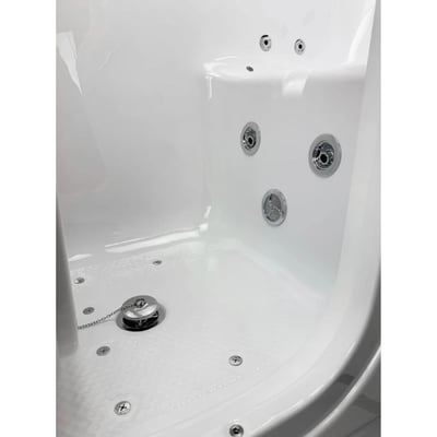 Interior view of the Ella S-Class walk-in tub showing chrome hydrotherapy jets, air jets, anti-slip floor, and drain