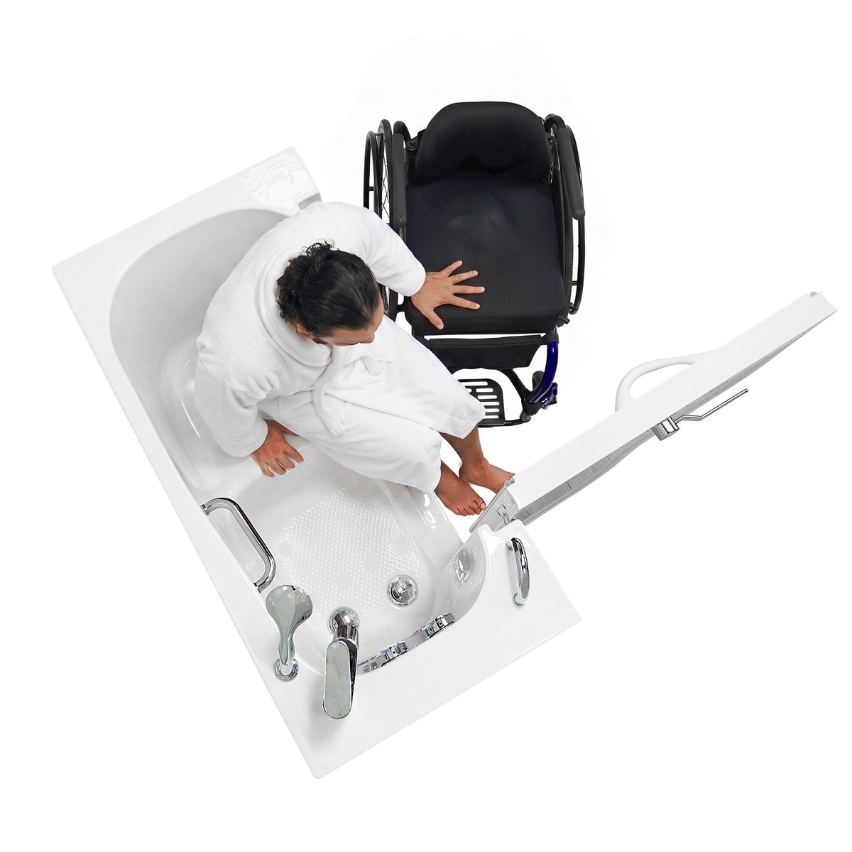 Overhead view of a man seated in an Ella Transfer26 walk-in tub with his wheelchair parked at the rim beside the open L-shape door