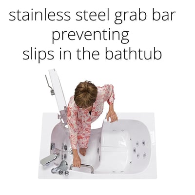Senior woman stepping into an Ella walk-in tub from above, gripping the stainless steel grab bar for slip prevention
