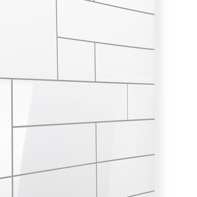 White glossy acrylic shower wall panel with subway tile pattern and gray grout lines, close-up corner view