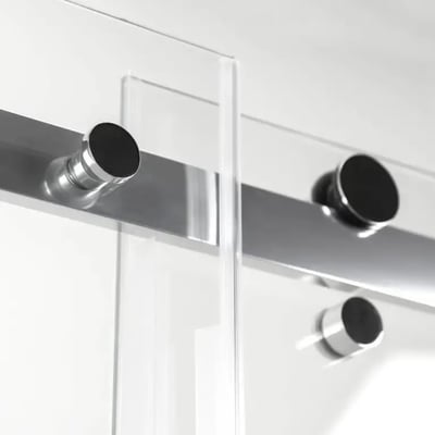 Close-up of chrome stainless steel rollers and track on a frameless 8mm tempered glass sliding shower door