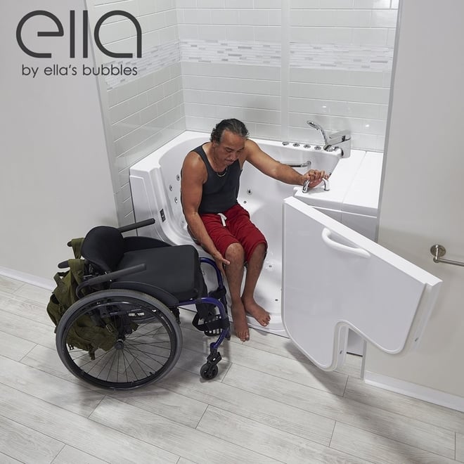Wheelchair user transferring from his chair into the Ella Transfer30 walk-in tub with open side door entry
