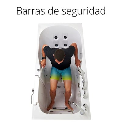 Vista superior de un hombre agarrando las barras de apoyo de seguridad dentro de una bañera de acceso Ella con suelo antideslizante y chorros de hidromasaje