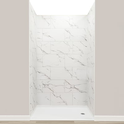 Ella's Bubbles wheelchair accessible shower stall with white marble-pattern wall panels and low-threshold shower base