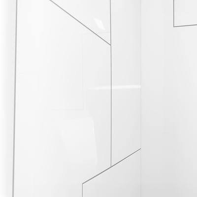 Close-up of white glossy acrylic shower wall panel with Urban Maze geometric pattern and grey grooves
