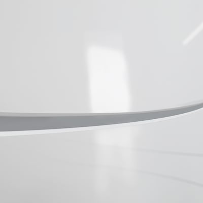Close-up of a glossy white acrylic walk-in tub rim showing a curved edge with gray trim detail
