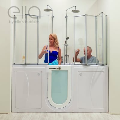 Couple using the Ella Big4Two two-seat walk-in tub with dual rain showerheads and folding glass shower panels