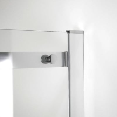 Close-up of chrome handle hardware and tempered glass panel on an Ella sliding shower door frame corner
