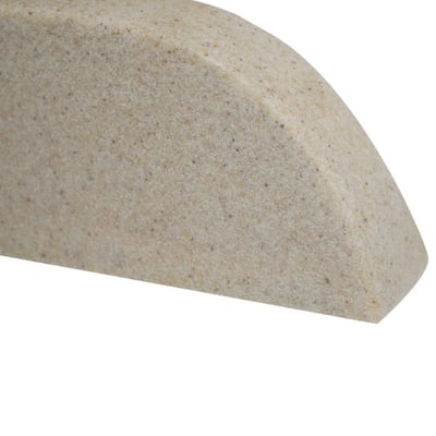 Close-up of Ella cultured marble wall-mount shower shelf in travertine sandstone finish with rounded edge detail