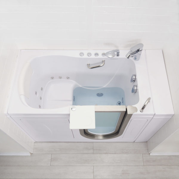 Independent Foot & Calf Massage (Optional) - %3E - Overhead view of Ella Elite walk-in tub with open side door, water jets, chrome faucet, and attached swivel tray on right side