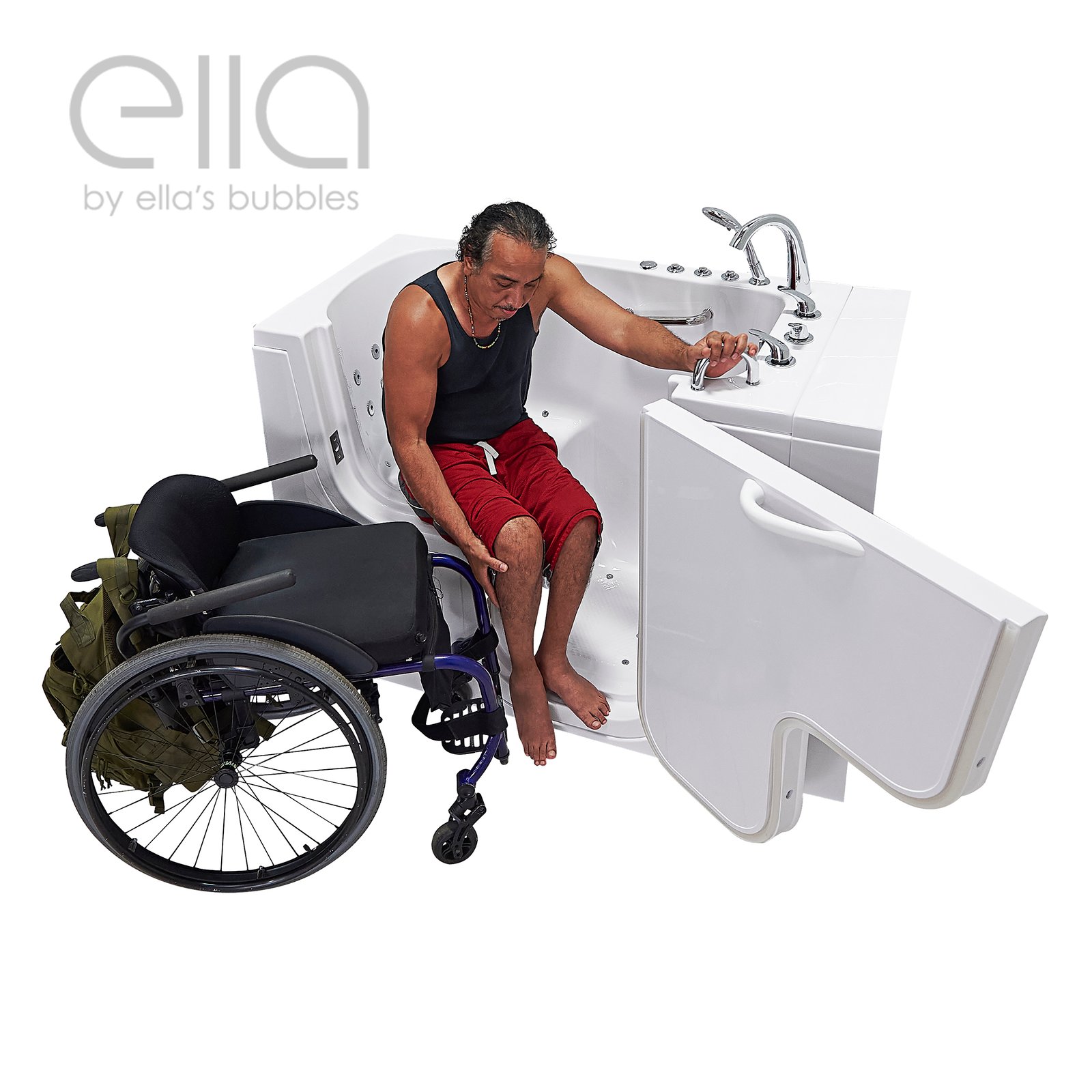Wheelchair user transferring into the Ella Transfer 30 walk-in tub with wide door open and grab bar support nearby