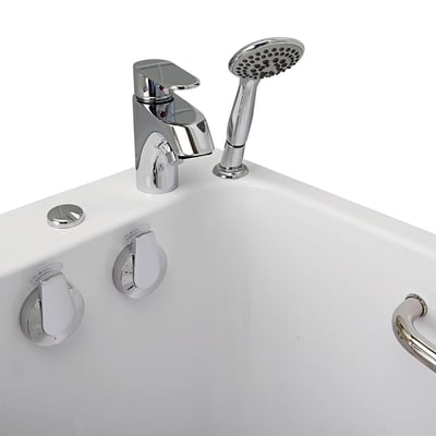 Close-up of Ella walk-in tub chrome single-lever faucet, handheld showerhead, jet controls, and grab bar on white acrylic deck