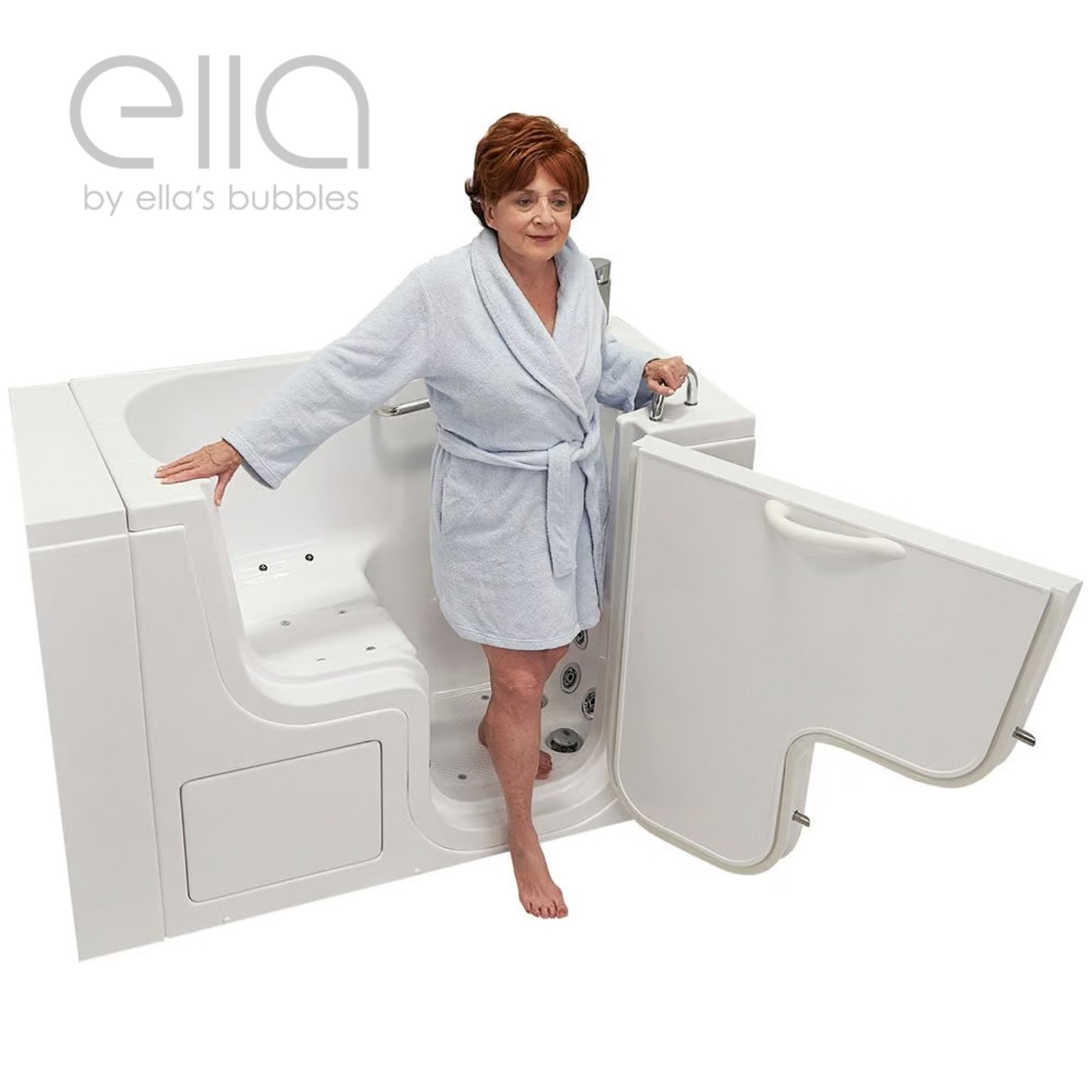 Senior woman in blue robe stepping into the Ella Transfer26 wheelchair accessible walk-in tub with outward swing door open